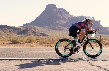 Athlete in Arizona biking at sunset