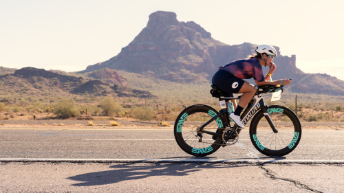 Athlete in Arizona biking at sunset