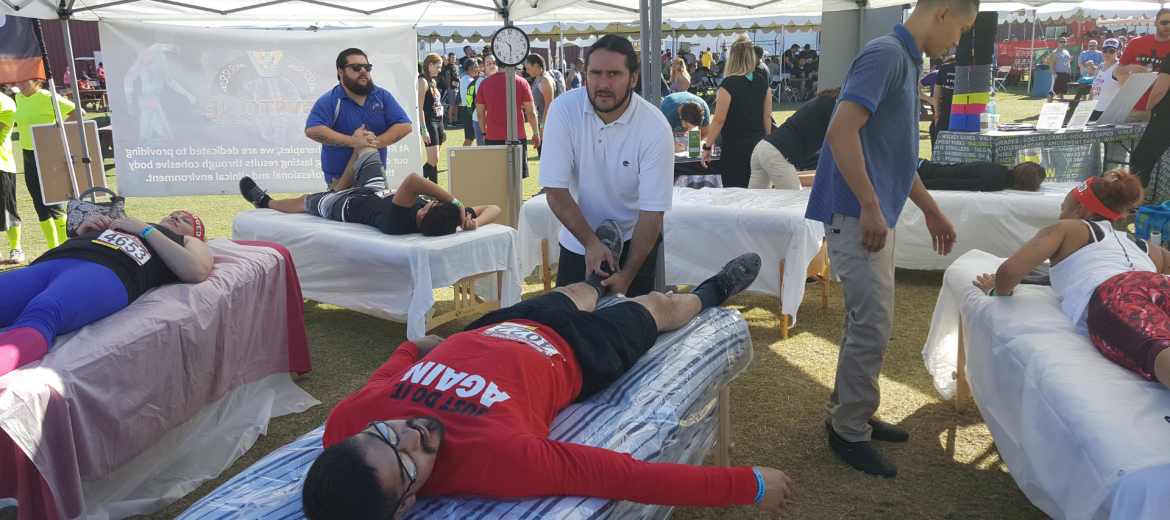 runner getting therapeutic bodywork post-race