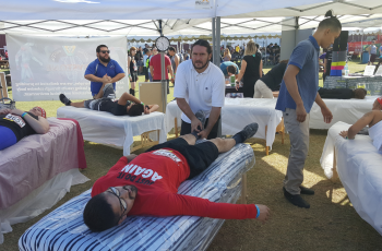 runner getting therapeutic bodywork post-race