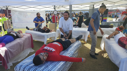 runner getting therapeutic bodywork post-race