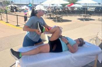Therapeutic bodywork supporting injury recovery for athlete
