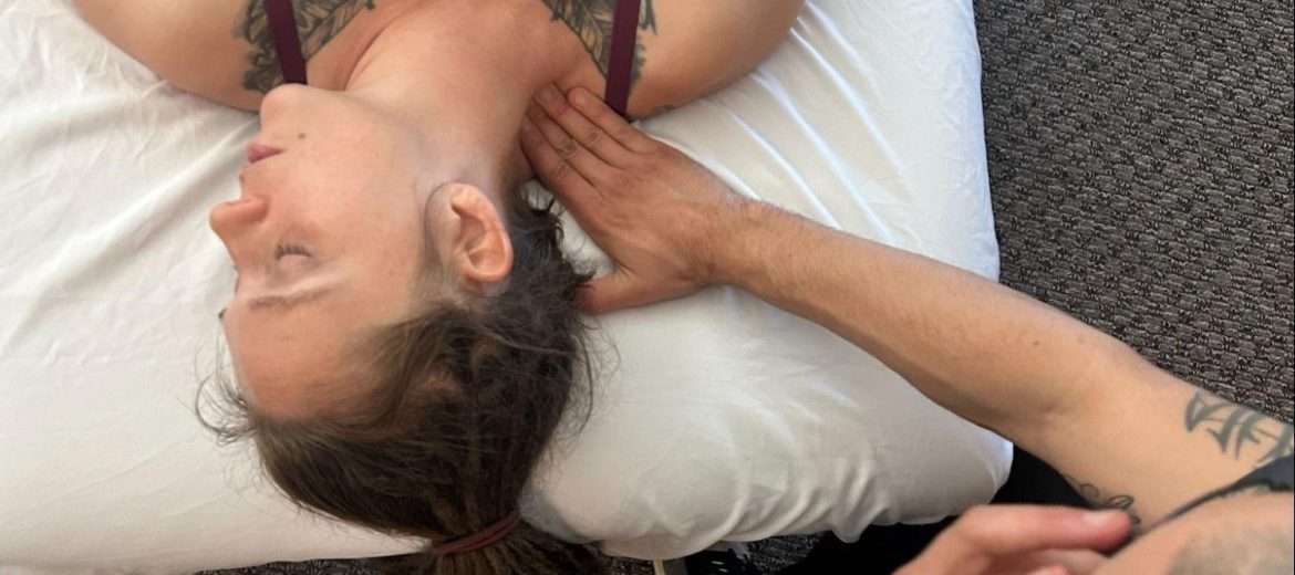 Therapeutic bodywork releasing upper back tension